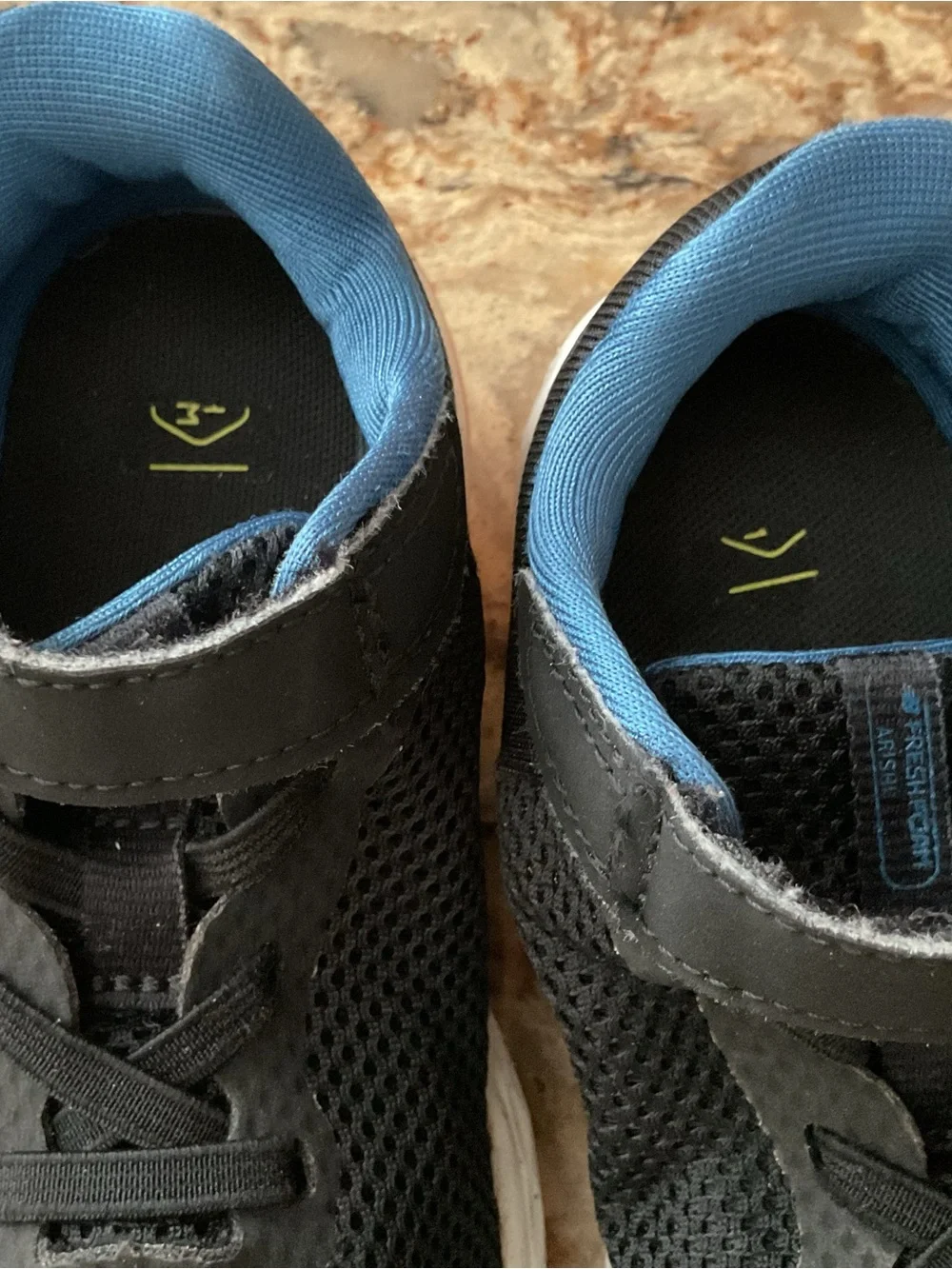 New Balance Kids Black Sneakers with Blue Lining and Coral Accent